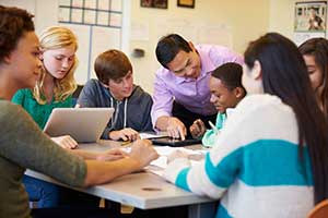 Teacher working in a blended learning classroom