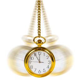 pocket-watch swinging in a pendulum motion