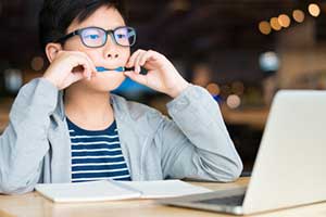 Child using his critical thinking skills during game based learning